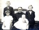 Helena (Hartbeck) Wessel and 4 grandchildren in 1912 - Harold, Donald, Freda, and Cora